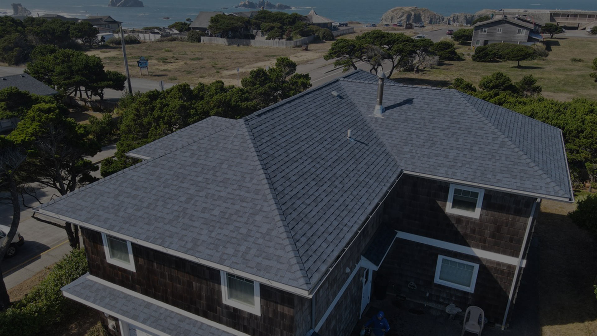residential property aerial view with asphalt shingles roof coos bay or